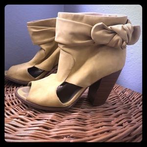 Faded yellow peep toe bootie